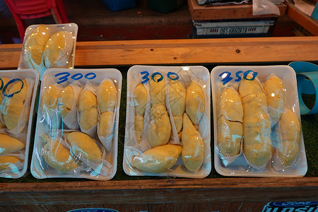 富通市在市场上销售的包件中产黄果 在泰国作为季节性水果包装中的黄当量核糖榴莲食物农场营养情调营养素国王生食味道热带背景