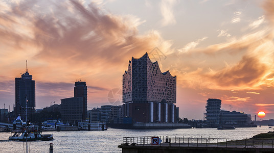 易北爱乐乐团日出时横渡河流的汉堡建筑建筑学城市天际旅行市中心歌剧地标运河背景