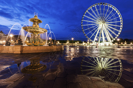 摩天轮广场巴黎和谐之地和Ferris轮景观建筑学黑暗路灯地标正方形车轮蓝色喷泉街道背景