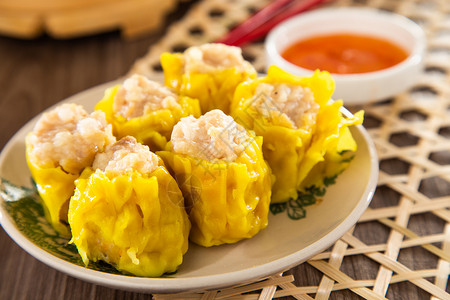 奔驰迈凯轮超跑Siu Mai  中国竹轮蒸汽猪尾箱的中国蒸猪排小吃点心食物碎麦猪肉饺子盘子水饺午餐美食背景