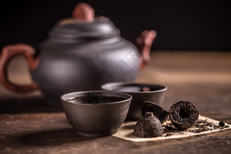云南腾冲热海大滚锅热茶饮料棕色黑色静物仪式香气杯子茶叶发酵圆形背景