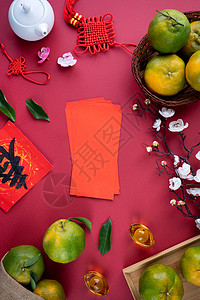 新年中国月球红背景的 新鲜橘子曼达林柑橘最亮的景象叶子食物收成桌子热带农业财富运气橙子高架背景图片