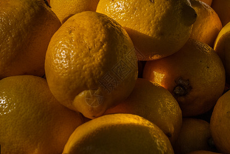 来自市场的橙色果汁水果收成背景图片