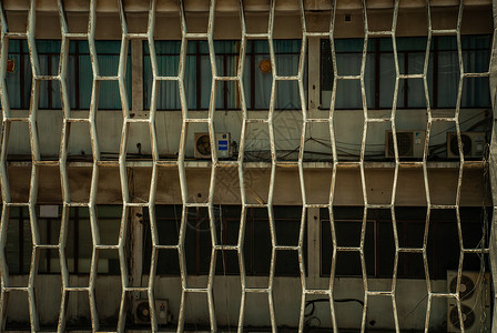 带窗户的建筑物的建筑背景纹理图案城市玻璃背景图片