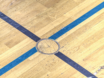 手球比赛学校健身房地板体育器材的圆圈盖塞背景