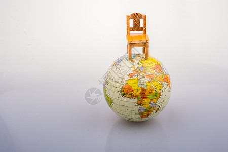 模拟地球顶端的座椅行星椅子经济战略指导图表全球座位全世界世界背景图片