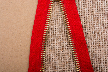 特写色彩多彩的拉链裁缝压缩紧固件纺织品时尚金属背景图片