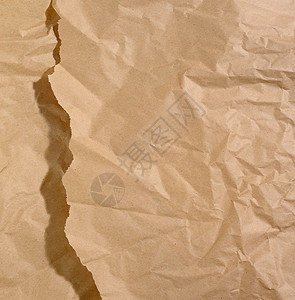 薄荷棕色纸 有撕破的边缘和阴影背景图片