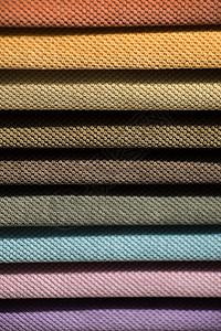 各种颜色和类型的织物示例店铺棉布裁缝面料家具缝纫纺织品材料背景图片