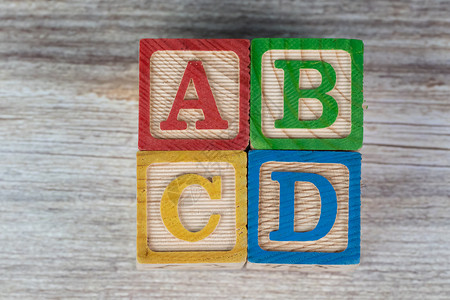ABCD 木块字母拼图背景图片