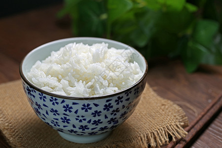 饭碗里的米美食家食谱大米密封餐饮米饭元素蓝色白色谷类背景图片