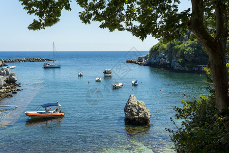 奥皮里奥希腊佩利翁达穆沙里希腊渔村树木海滩海洋支撑岩石树叶农村乡村地标海湾背景