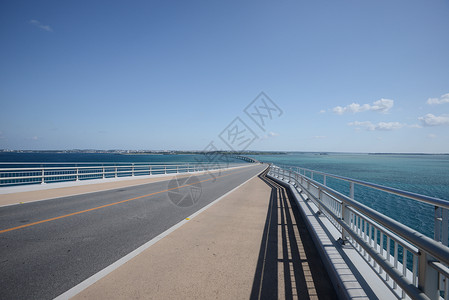 宫岛海假期白色晴天天空蓝色海洋绿色热带海滩背景图片