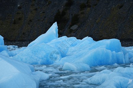 智利巴塔哥尼亚冰川灰色的蓝冰蓝色痛苦旅行公园旅游山脉国家场地天空冰山背景图片