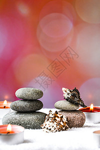 Zen概念 温泉石块和燃烧的芳香蜡烛海壳 治疗芳雾疗法和按摩复制空间香气身体火焰石头烛光作品贝壳奢华岩石卵石图片