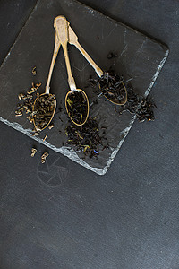 不同类型的茶叶树叶桌子饮食绿茶乡村红茶勺子蜂蜜蜜匙生物背景图片