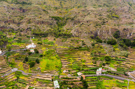 拉戈梅拉岛西班牙加那利群岛戈梅拉岛的山脉全景 戈梅拉岛的美丽风景小岛自然顶峰地平线地理群岛石头地球房子爬坡背景