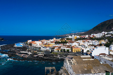 西班牙加那利群岛特内里费岛的海滩 加那利群岛加拉奇科鸟瞰图太阳热带海岸旅游村庄旅行蓝色海洋城市天空背景