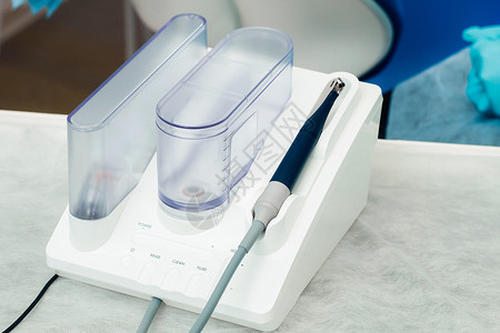 牙科办公室的超声波缩压器 牙科概念牙齿手套手术橡皮乐器药品外科卫生工具诊所背景图片