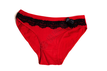 红色女性内裤和黑色带条的红女性内裤在白色上被孤立背景图片