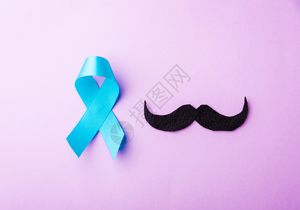 黑胡子纸和淡蓝色丝带男士潮人癌症疾病生活机构蓝色世界卫生保健背景