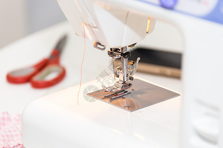 缝织机裁缝机器维修女裁缝纺织品制造业织物工作室工厂工具作坊高清图片素材