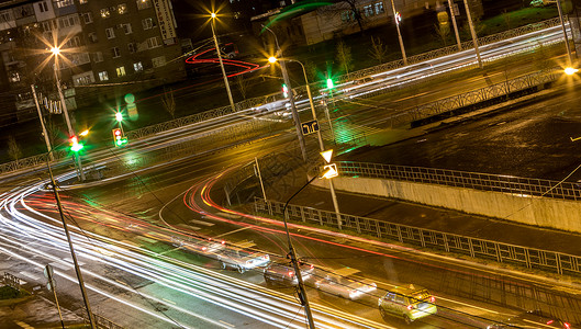 夜间路交叉路口运输运动速度街道汽车反射场景景观交通城市背景图片