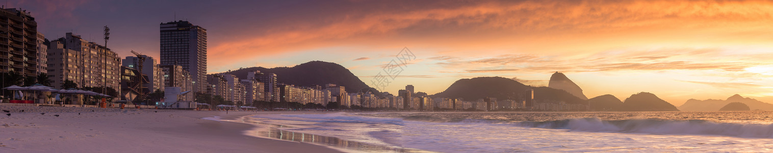 里约热内卢科帕卡巴纳和甘蔗湖山的日出风景海岸游客海洋旅行日落吸引力岩石景观地标城市背景