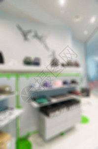 服装店的抽象模糊中心架子购物中心店铺消费者部门产品精品市场地面背景图片