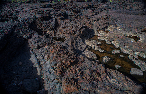 熔岩岩之景 林诺萨黑色土地地质学远洋岩石悬崖旅游侵蚀旅行风景背景图片