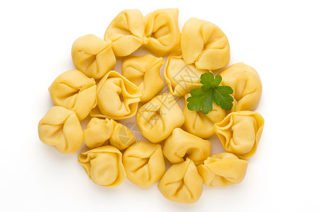 生自制的意大利面 托特利尼和草药白色食物盘子面团面条背景图片
