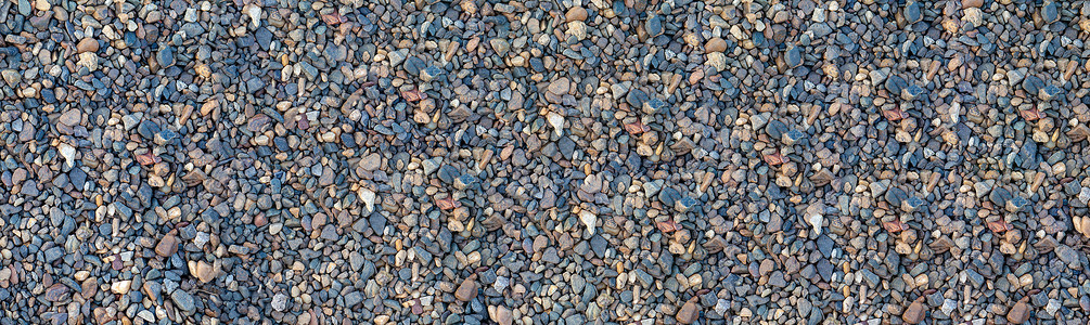 海边或前卫的小鹅卵石和石头的背景背景图片