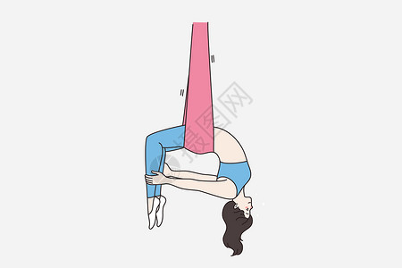 瑜伽课广告素材运动型女子在空中瑜伽课的吊床上训练设计图片