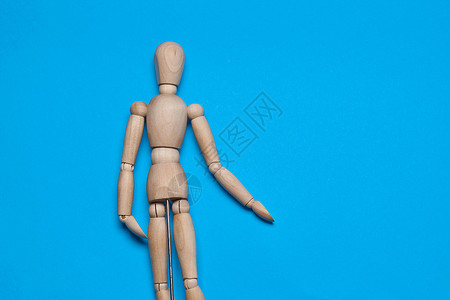 竖形蓝色蓝色背景的木形木图造假器物体人体男人身体数字行动白色艺术家木偶商业跑步背景