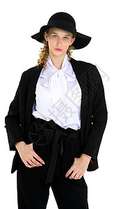 女式西装身着办公服和帽子的年轻女性肖像背景