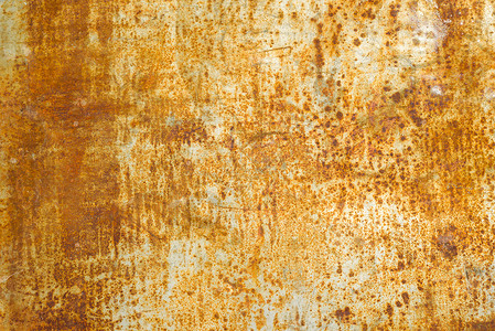 金属墙抽象腐蚀的生锈金属背景 质地 黄褐色风化盘子墙纸材料古董投掷建造艺术乡村衰变背景