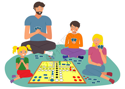 家庭之夜游戏家庭活动 人们在家里玩地板上的纸牌游戏很开心 花时间家庭 棋盘游戏设计图片