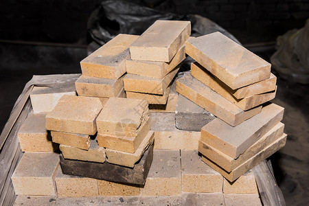 一堆耐火砖块 防火砖块建筑材料石头建筑耐火砖墙纸烤箱水泥材料黏土橙子背景