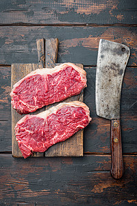 食用牛排 大理石牛肉肉 在黑木背景上 顶层风景桌子奶牛木质牛扒腰部深色背景图片