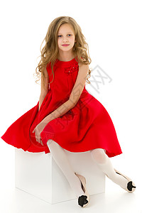斯图奥摄影机前的红衣美女彩色女郎童年衣服孩子头发裙子教育微笑青年相机工作室背景图片