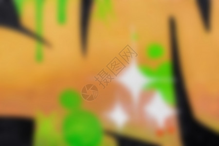墙壁背景上颜色橙色和绿色涂鸦的模糊背景的背景建筑街道艺术文化书法橙子墙纸城市破坏者艺术品背景图片