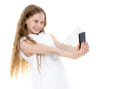 可爱的小女孩做自拍技术家庭青年乐趣喜悦摄影幸福快乐微笑照片背景图片