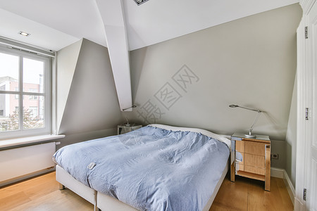 床间有一张大软床装饰财产建筑学奢华财富住宅公寓风格建筑房子背景图片