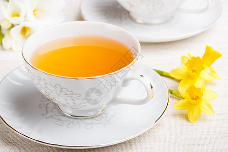 水仙茶素材一杯茶茶点茶碗水仙饮料疗法芳香草本水仙花草本植物白色背景