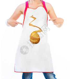 穿着厨房围裙的漂亮女人背景图片