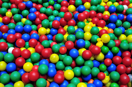 彩色球背景绿色概念活动中心享受孩子蓝色闲暇操场童年背景图片