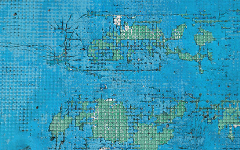 Grunge 蓝色背景的复古彩绘表面地面绿色裂缝工业材料背景图片