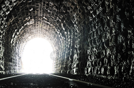 隧道尾灯光石头旅行曲线智慧希望入口牵引胡同黑暗成就背景图片