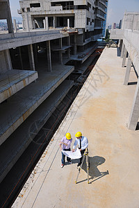 修复工地的建筑师小组经理生意建筑学商务成功办公室会议蓝图伙伴项目背景图片