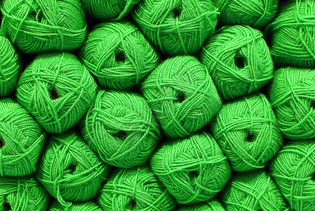绿色羊毛球 漂亮的彩色羊毛球 羊毛质地 纱线束 针织的天然材料 创意 抽象的 diy 背景纤维编织手工衣服橙子爱好棉布针线活蓝色背景图片